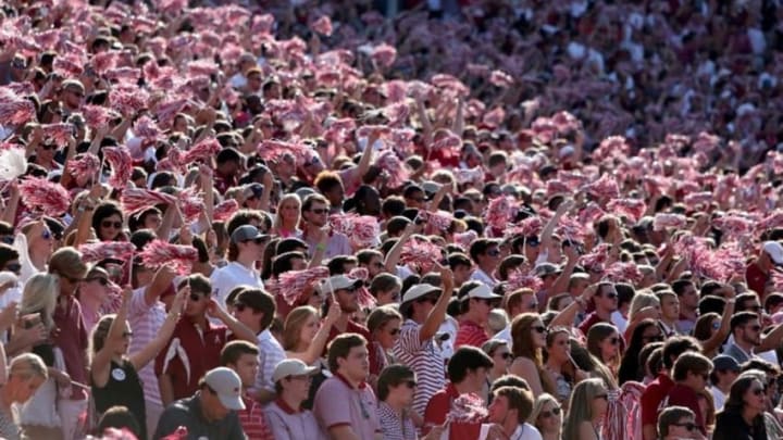 Sep 20, 2014; Tuscaloosa, AL, USA; Alabama Crimson Tide fans cheer after a touchdown in the second quarter of their game against the Florida Gators at Bryant-Denny Stadium. Alabama won 42-21. Mandatory Credit: Jason Getz-USA TODAY Sports