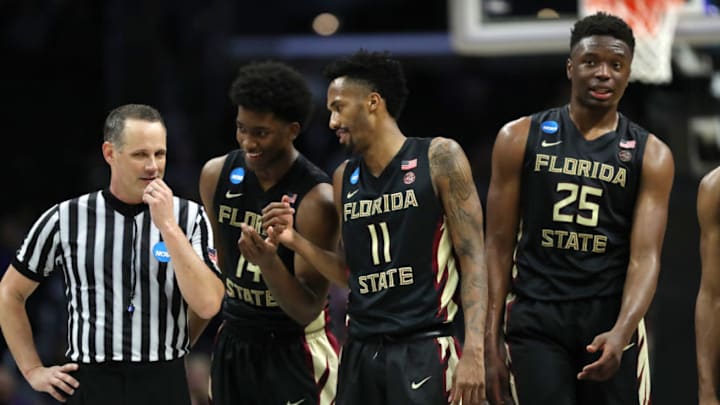 LOS ANGELES, CA - MARCH 22: Terance Mann #14, Braian Angola #11 and Mfiondu Kabengele #25 of the Florida State Seminoles react late in the game in their teams win over the Gonzaga Bulldogs during the second half in the 2018 NCAA Men's Basketball Tournament West Regional at Staples Center on March 22, 2018 in Los Angeles, California. The Florida State Seminoles defeated the Gonzaga Bulldogs 75-60. (Photo by Ezra Shaw/Getty Images)