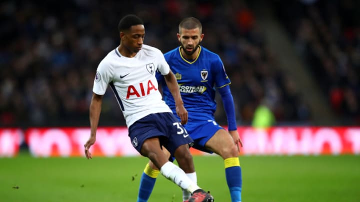 LONDON, ENGLAND - JANUARY 07: Kyle Walker-Peters of Tottenham Hotspur and George Francomb of AFC Wimbledon during The Emirates FA Cup Third Round match between Tottenham Hotspur and AFC Wimbledon at Wembley Stadium on January 7, 2018 in London, England. (Photo by Julian Finney/Getty Images)