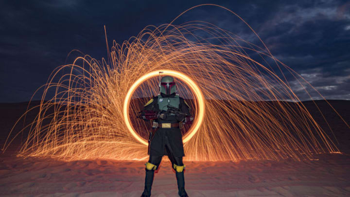 WINTERHAVEN, CALIFORNIA - JANUARY 15: Star Wars cosplayer Shawn Richter as Boba Fett poses for photos at Buttercup Sand Dunes on January 15, 2022 in Winterhaven, California. Buttercup San Dunes was the location of several iconic scenes filmed for Star Wars: Return of the Jedi. (Photo by Daniel Knighton/Getty Images)