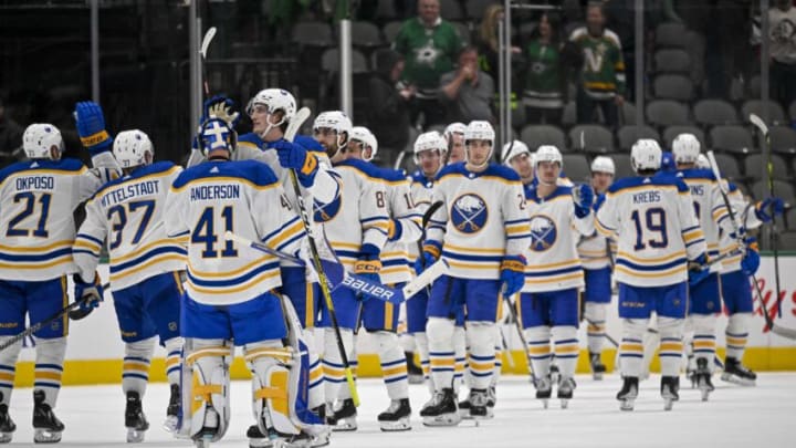 Jan 23, 2023; Dallas, Texas, USA; Buffalo Sabres goaltender Craig Anderson (41) and the Sabres celebrate the overtime win over the Dallas Stars at the American Airlines Center. Mandatory Credit: Jerome Miron-USA TODAY Sports