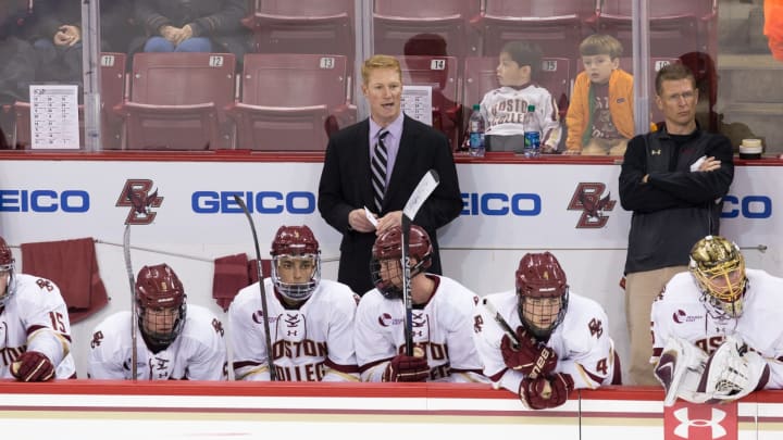 CHESTNUT HILL, MA – OCTOBER 28: Associate Coach Greg Brown of the Boston College Eagles stands behind the bench as he fills-in for head coach Jerry York who is recovering from eye surgery during NCAA hockey against the Providence College Friars at Kelley Rink on October 28, 2016 in Chestnut Hill, Massachusetts. The Eagles won 3-1. (Photo by Richard T Gagnon/Getty Images)