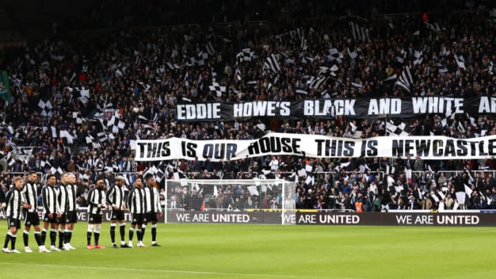 Newcastle United line up as fans display a welcome message to new manager, Eddie Howe, who was not able to attend after testing positive for Covid-19 prior to the Premier League match against Brentford at St. James Park on November 20, 2021 in Newcastle upon Tyne, England. (Photo by George Wood/Getty Images)
