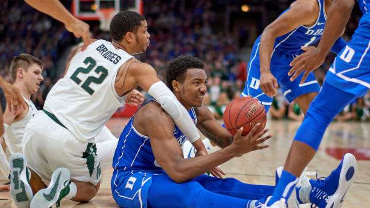 CHICAGO, IL - NOVEMBER 14: Michigan State Spartans guard Miles Bridges (22) battles with Duke Blue Devils forward Wendell Carter Jr (34) for a loose ball during the State Farm Classic Champions Classic game between the Duke Blue Devils and the Michigan State Spartans on November 14, 2017, at the United Center in Chicago, IL. (Photo by Robin Alam/Icon Sportswire via Getty Images)