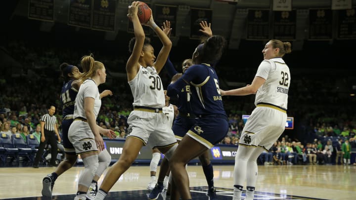 SOUTH BEND, IN – FEBRUARY 03: Notre Dame Fight Irish center Mikayla Vaughn (30) pulls down the rebound during the game between the Georgia Tech Yellow Jackets and the Notre Dame Fighting Irish on February 03, 2019, at Purcell Pavilion in South Bend IN. (Photo by Jeffrey Brown/Icon Sportswire via Getty Images)