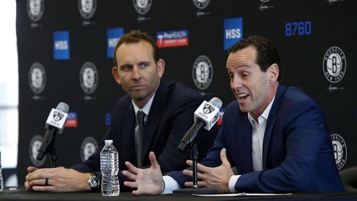 May 16, 2016; Brooklyn, NY, USA; Brooklyn Nets general manager Sean Marks listens to Brooklyn Nets new head coach Kenny Atkinson answer questions from media during press conference at HSS Training Center. Mandatory Credit: Noah K. Murray-USA TODAY Sports