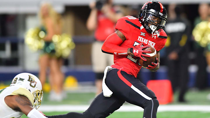 Keke Coutee #20 of the Texas Tech Red Raiders gets past Orion Stewart #28 of the Baylor Bears. (Photo by John Weast/Getty Images)