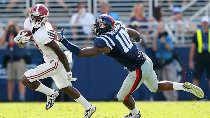 OXFORD, MS – SEPTEMBER 17: Calvin Ridley #3 of the Alabama Crimson Tide attempts to break a tackle from Marquis Haynes #10 of the Mississippi Rebels at Vaught-Hemingway Stadium on September 17, 2016 in Oxford, Mississippi. (Photo by Kevin C. Cox/Getty Images)