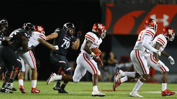 Sep 15, 2016; Cincinnati, OH, USA; Houston Cougars linebacker Steven Taylor (41) carries the ball for a touchdown after making an interception against the Cincinnati Bearcats in the second half at Nippert Stadium. Houston won 40-16. Mandatory Credit: Aaron Doster-USA TODAY Sports