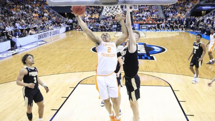 LOUISVILLE, KENTUCKY - MARCH 28: Grant Williams #2 of the Tennessee Volunteers shoots over Matt Haarms #32 of the Purdue Boilermakers during overtime of the 2019 NCAA Men's Basketball Tournament South Regional at the KFC YUM! Center on March 28, 2019 in Louisville, Kentucky. (Photo by Andy Lyons/Getty Images)