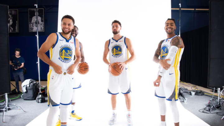SAN FRANCISCO, CA - SEPTEMBER 30: Stephen Curry #30, Draymond Green #23, Klay Thompson #11, and D'Angelo Russell #0 of the Golden State Warriors pose for a portrait during media day on September 30, 2019 at the Biofreeze Performance Center in San Francisco, California. NOTE TO USER: User expressly acknowledges and agrees that, by downloading and/or using this photograph, user is consenting to the terms and conditions of the Getty Images License Agreement. Mandatory Copyright Notice: Copyright 2019 NBAE (Photo by Noah Graham/NBAE via Getty Images)