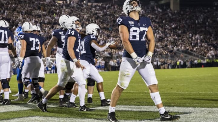 STATE COLLEGE, PA - SEPTEMBER 07: Pat Freiermuth #87 of the Penn State Nittany Lions celebrates after Noah Cain #21 of the Penn State Nittany Lions scores a touchdown against the Buffalo Bulls during the second half at Beaver Stadium on September 07, 2019 in State College, Pennsylvania. (Photo by Scott Taetsch/Getty Images)