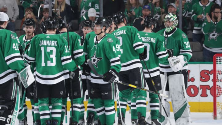 DALLAS, TX - APRIL 6: Ben Bishop #30 of the Dallas Stars is congratulated on a win against the Minnesota Wild at the American Airlines Center on April 6, 2019 in Dallas, Texas. (Photo by Glenn James/NHLI via Getty Images)