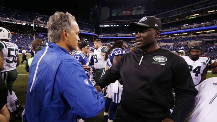 Sep 21, 2015; Indianapolis, IN, USA; Indianapolis Colts coach Chuck Pagano shakes hands after the game with New York Jets coachTodd Bowles at Lucas Oil Stadium. New York Jets defeat the Indianapolis Colts 20-7. Mandatory Credit: Brian Spurlock-USA TODAY Sports