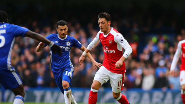 February 4th 2017, Stamford Bridge, Chelsea, London, England, EPL Premier league football, Chelsea versus Arsenal; Mesut Ozil of Arsenal chased by Pedro of Chelsea (Photo by Mark Kerton/Action Plus via Getty Images)