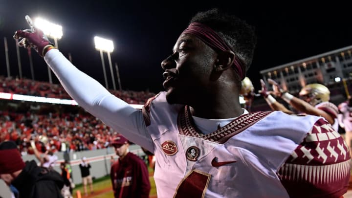 RALEIGH, NC - NOVEMBER 05: Defensive back Tarvarus McFadden #4 of the Florida State Seminoles waves to the crowd following the Florida State Seminoles' victory over the North Carolina State Wolfpack at Carter-Finley Stadium on November 5, 2016 in Raleigh, North Carolina. (Photo by Mike Comer/Getty Images)
