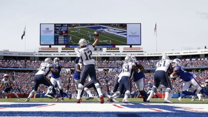 ORCHARD PARK, NY - SEPTEMBER 29: Tom Brady #12 of the New England Patriots throws a pass to Julian Edelman #11 of the New England Patriots during the first half against the Buffalo Bills at New Era Field on September 29, 2019 in Orchard Park, New York. (Photo by Timothy T Ludwig/Getty Images)