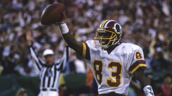 Washington Redskins wide receiver Ricky Sanders celebrates a touchdown in a 42-10 winover the Denver Broncos in Super Bowl XXII on January 31, 1988 at Jack Murphy Stadium in San Diego, California. (Photo by Rob Brown/Getty Images) *** Local Caption ***