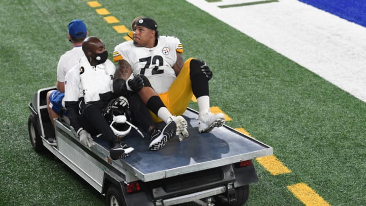 EAST RUTHERFORD, NEW JERSEY - SEPTEMBER 14: Zach Banner #72 of the Pittsburgh Steelers is taken off the field after sustaining an injury during the second half against the New York Giants at MetLife Stadium on September 14, 2020 in East Rutherford, New Jersey. (Photo by Sarah Stier/Getty Images)