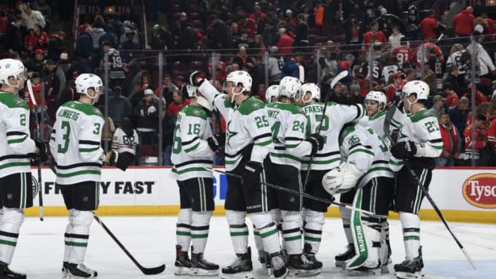 CHICAGO, IL - FEBRUARY 24: The Dallas Stars celebrate after defeating the Chicago Blackhawks 4-3 at the United Center on February 24, 2019 in Chicago, Illinois. (Photo by Bill Smith/NHLI via Getty Images)