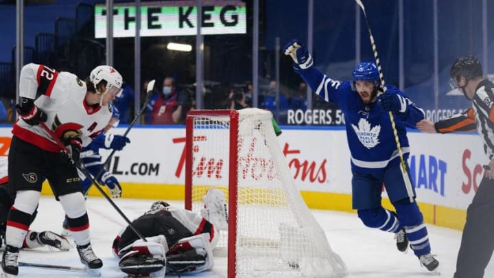 Toronto Maple Leafs forward Alexander Kerfoot (15) celebrates scoring. (John E. Sokolowski/USA TODAY Sports)