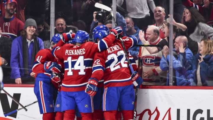 MONTREAL, QC - JANUARY 07: Members of the Montreal Canadiens celebrate a third period goal by Brendan Gallagher
