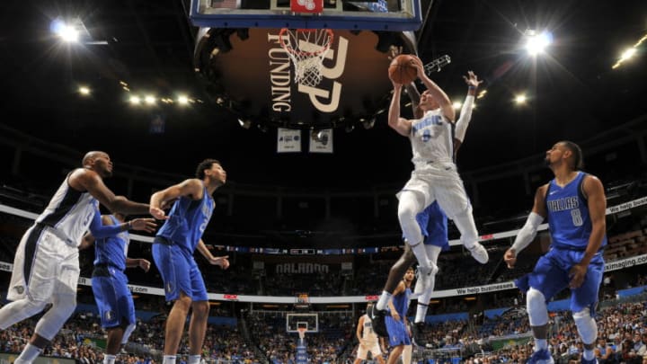 ORLANDO, FL - OCTOBER 5: Mario Hezonja #8 of the Orlando Magic goes to the basket against the Dallas Mavericks during a preseason game on October 5, 2017 at Amway Center in Orlando, Florida. NOTE TO USER: User expressly acknowledges and agrees that, by downloading and or using this photograph, User is consenting to the terms and conditions of the Getty Images License Agreement. Mandatory Copyright Notice: Copyright 2017 NBAE (Photo by Fernando Medina/NBAE via Getty Images)