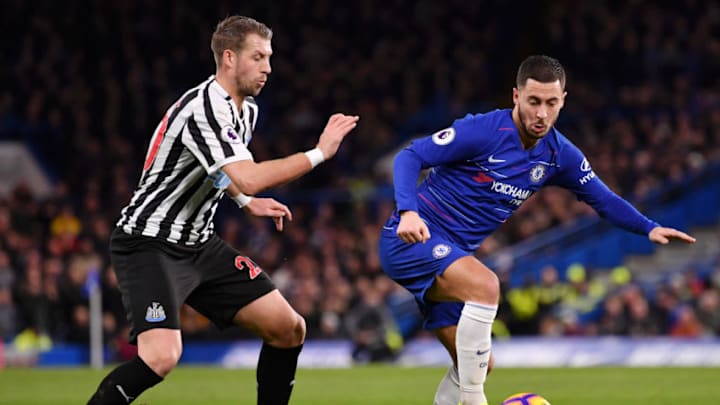 LONDON, ENGLAND - JANUARY 12: Eden Hazard of Chelsea is challenged by Florian Lejeune of Newcastle United during the Premier League match between Chelsea FC and Newcastle United at Stamford Bridge on January 12, 2019 in London, United Kingdom. (Photo by Justin Setterfield/Getty Images)