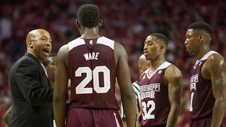 Feb 7, 2015; Fayetteville, AR, USA; Mississippi State Bulldogs head coach Rick Ray talks with guard Craig Sword (32) forward Gavin Ware (20) and guard Fred Thomas (1) during a game against the Arkansas Razorbacks at Bud Walton Arena. Arkansas defeated Mississippi State 61-41. Mandatory Credit: Beth Hall-USA TODAY Sports