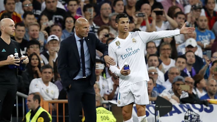 MADRID, SPAIN - OCTOBER 01: Cristiano Ronaldo (R) of Real Madrid talks to head coach Zinedine Zidane during the La Liga match between Real Madrid and Espanyol at Estadio Santiago Bernabeu on October 1, 2017 in Madrid, Spain. (Photo by Angel Martinez/Real Madrid via Getty Images)