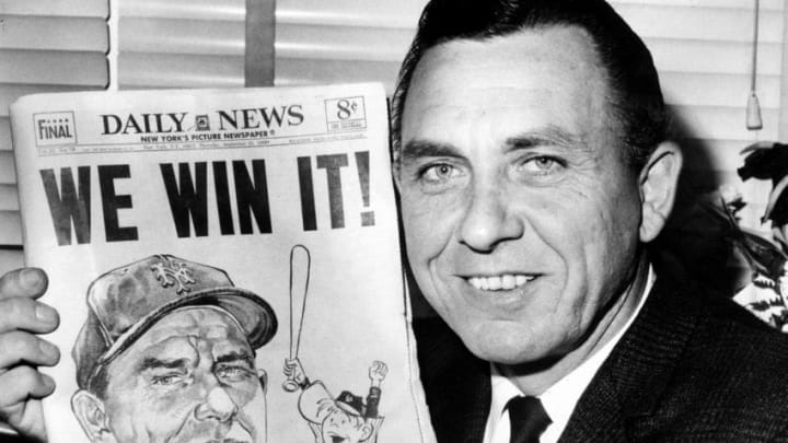 UNITED STATES - SEPTEMBER 25: New York Mets' manager Gil Hodges holds up copy of the Daily News proclaiming amazin' victory over the St. Louis Cardinals for National League East title. (Photo by Bill Meurer/NY Daily News Archive via Getty Images)