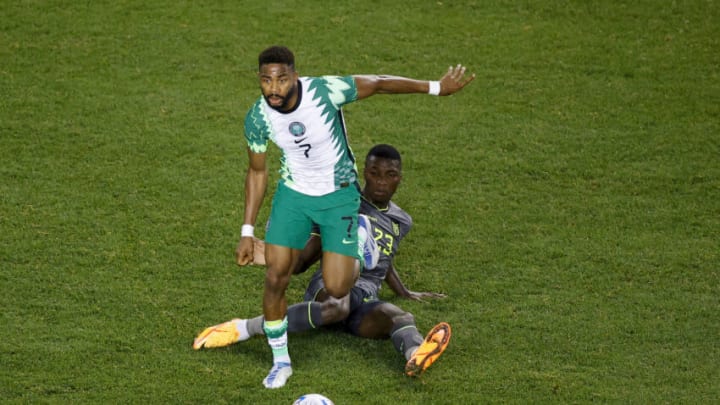 HARRISON, NEW JERSEY - JUNE 02: Emmanuel Dennis #7 of Nigeria dribbles past Moises Caicedo #23 of Ecuador during the second half at Red Bull Arena on June 02, 2022 in Harrison, New Jersey. (Photo by Tim Nwachukwu/Getty Images)