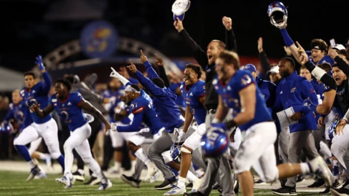 LAWRENCE, KANSAS - OCTOBER 26: The Kansas Jayhawks storm the field and celebrate as they defeat the Texas Tech Red Raiders 37-34 to win the game at Memorial Stadium on October 26, 2019 in Lawrence, Kansas. (Photo by Jamie Squire/Getty Images)