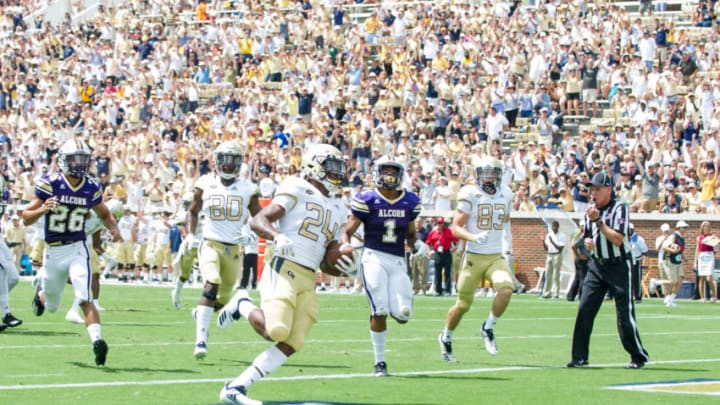 ATLANTA, GA - SEPTEMBER 1: Running back Jordan Mason #24 of the Georgia Tech Yellow Jackets runs the ball in for a touchdown in front of defensive back Daylon Burks #1 of the Alcorn State Braves at Bobby Dodd Stadium on September 1, 2018 in Atlanta, Georgia. (Photo by Michael Chang/Getty Images)