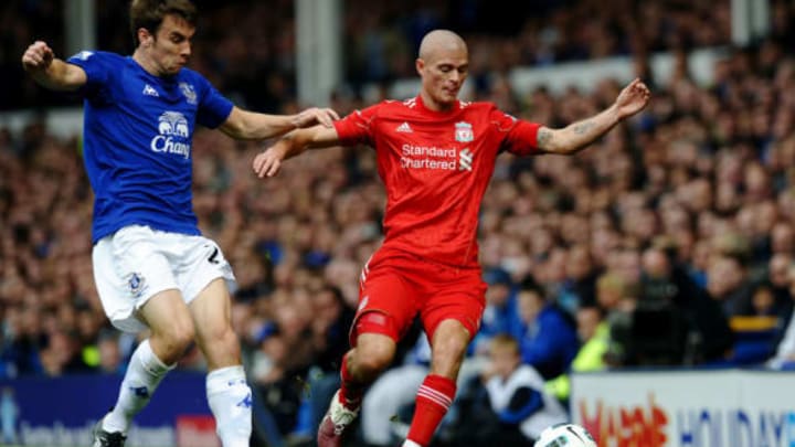 Liverpool’s English defender Paul Konchesky (R) shields the ball from Everton’s Irish defender Seamus Coleman during their English Premier League football match against Everton at Goodison Park in Liverpool, north-west England, on October 17, 2010. AFP PHOTO/PAUL ELLIS – FOR EDITORIAL USE ONLY Additional licence required for any commercial/promotional use or use on TV or internet (except identical online version of newspaper) of Premier League/Football League photos. Tel DataCo 44 207 2981656. Do not alter/modify photo. (Photo credit should read PAUL ELLIS/AFP/Getty Images)