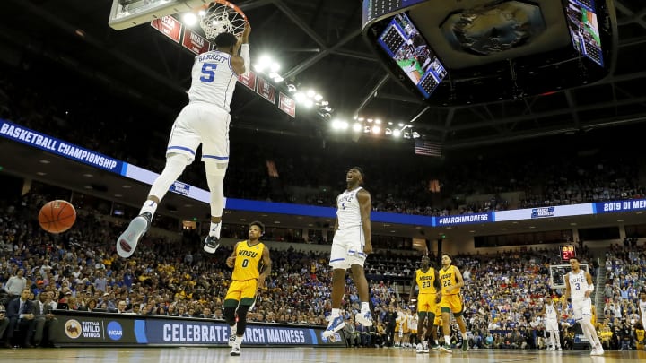 COLUMBIA, SOUTH CAROLINA – MARCH 22: RJ Barrett #5 of the Duke Blue Devils dunks the ball as teammate Zion Williamson #1 celebrates against the North Dakota State Bison in the second half during the first round of the 2019 NCAA Men’s Basketball Tournament at Colonial Life Arena on March 22, 2019 in Columbia, South Carolina. (Photo by Kevin C. Cox/Getty Images)