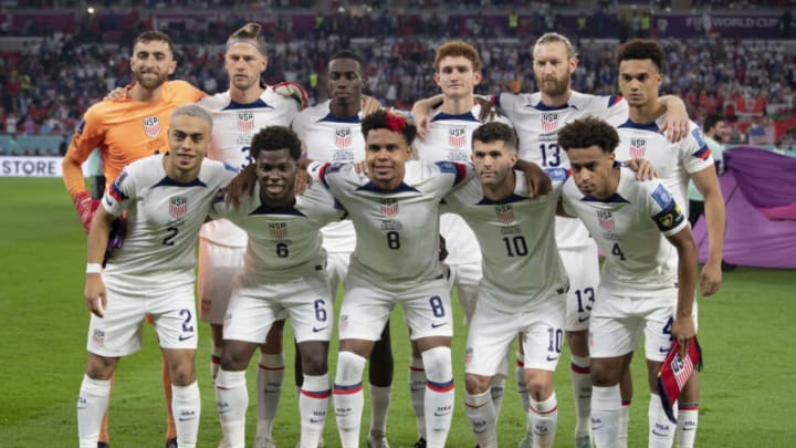 DOHA, QATAR - NOVEMBER 21: (Back row from l-r) Matt Turner, Walker Zimmermann, Timothy Weah, Joshua Sargent, Tim Ream, Antonee Robinson, (front row from l-r) Sergino Dest, Yunus Sargent, Weston McKennie, Christian Pulisic and Tyler Adams of USA line up for the team photo ahead of the FIFA World Cup Qatar 2022 Group B match between USA and Wales at Ahmad Bin Ali Stadium on November 21, 2022 in Doha, Qatar. (Photo by Visionhaus/Getty Images)