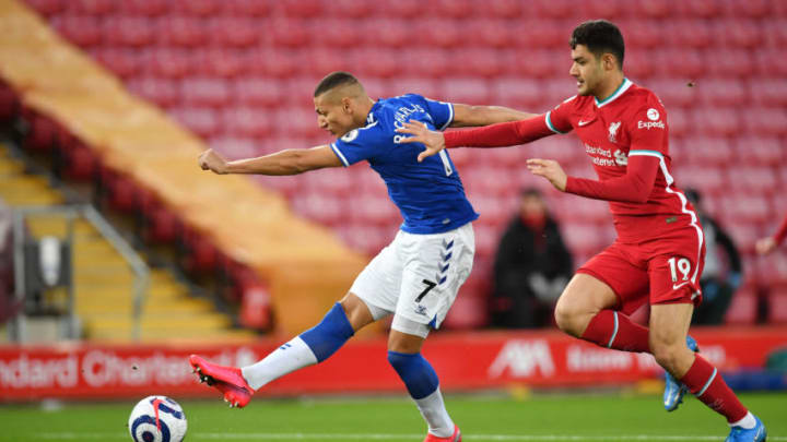 LIVERPOOL, ENGLAND - FEBRUARY 20: Richarlison of Everton scores his team's first goal during the Premier League match between Liverpool and Everton at Anfield on February 20, 2021 in Liverpool, England. Sporting stadiums around the UK remain under strict restrictions due to the Coronavirus Pandemic as Government social distancing laws prohibit fans inside venues resulting in games being played behind closed doors. (Photo by Paul Ellis - Pool/Getty Images)