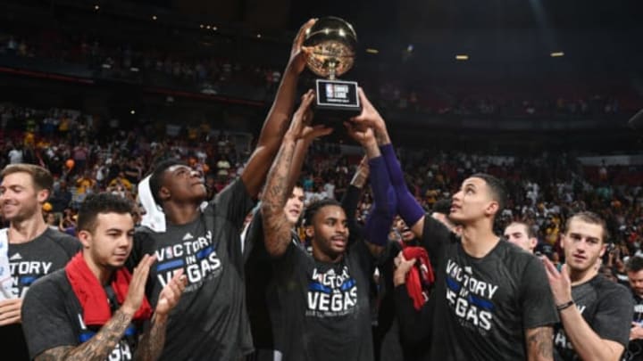 LAS VEGAS, NV – JULY 17: The Los Angeles Lakers hoist the NBA Summer League Championship trophy after the game against the Portland Trail Blazers during the 2017 Summer League Finals on July 17, 2017 at the Thomas & Mack Center in Las Vegas, Nevada. NOTE TO USER: User expressly acknowledges and agrees that, by downloading and/or using this Photograph, user is consenting to the terms and conditions of the Getty Images License Agreement. Mandatory Copyright Notice: Copyright 2017 NBAE (Photo by Garrett Ellwood/NBAE via Getty Images)