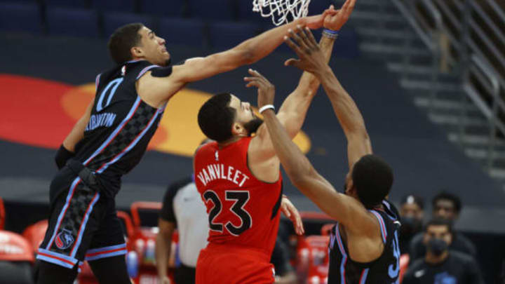 Jan 29, 2021; Tampa, Florida, USA; Toronto Raptors guard Fred VanVleet (23) makes a basket over Sacramento Kings guard Tyrese Haliburton (0) during the second half at Amalie Arena. Mandatory Credit: Kim Klement-USA TODAY Sports