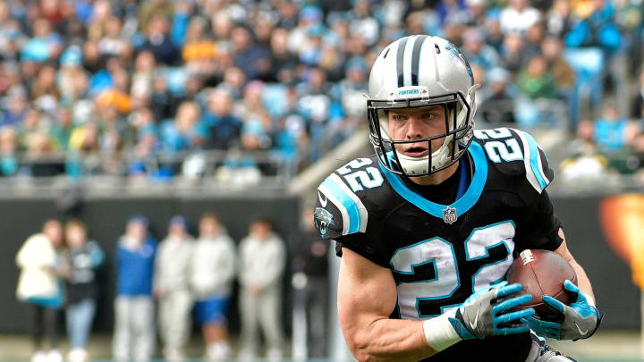 CHARLOTTE, NC – DECEMBER 17: Christian McCaffrey #22 of the Carolina Panthers runs the ball against the Green Bay Packers in the first quarter during their game at Bank of America Stadium on December 17, 2017 in Charlotte, North Carolina. (Photo by Grant Halverson/Getty Images)