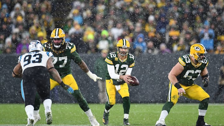 GREEN BAY, WISCONSIN - NOVEMBER 10: Aaron Rodgers #12 of the Green Bay Packers takes the snap during a game against the Carolina Panthers at Lambeau Field on November 10, 2019 in Green Bay, Wisconsin. The Packers defeated the Panthers 24-16. (Photo by Stacy Revere/Getty Images)