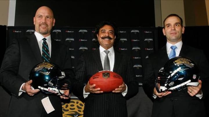 Jan 18, 2013; Jacksonville FL, USA; Jacksonville Jaguars head coach Gus Bradley, owner Shad Khan and general manager Dave Caldwell pose for photos after at a press conference at EverBank Field. Mandatory Credit: Phil Sears-USA TODAY Sports