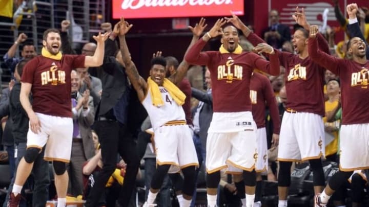 May 4, 2016; Cleveland, OH, USA; The Cleveland Cavaliers bench, including forward Kevin Love (0), guard Iman Shumpert (4), guard J.R. Smith (5), and center Tristan Thompson (13) celebrate Cleveland Cavaliers guard Mo Williams
