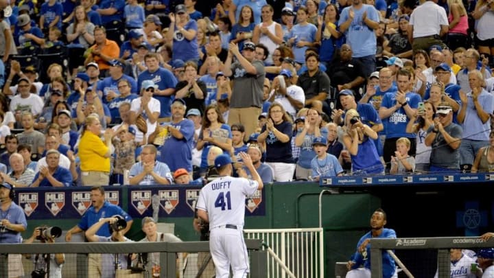 Jul 7, 2016; Kansas City, MO, USA; Kansas City Royals relief pitcher Danny Duffy (41) waves to the fans as he walks to the dugout after being relieved in the seventh inning against the Seattle Mariners at Kauffman Stadium. Mandatory Credit: Denny Medley-USA TODAY Sports