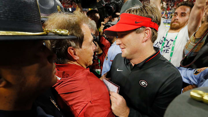 ATLANTA, GA – DECEMBER 01: Head coach Nick Saban of the Alabama Crimson Tide shakes hands with head coach Kirby Smart of the Georgia Bulldogs after the Alabama Crimson Tide defeated the Georgia Bulldogs 35-28 in the 2018 SEC Championship Game at Mercedes-Benz Stadium on December 1, 2018 in Atlanta, Georgia. (Photo by Kevin C. Cox/Getty Images)