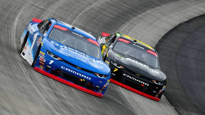 DOVER, DE - MAY 05: Elliott Sadler, driver of the #1 OneMain Financial Chevrolet, leads Justin Allgaier, driver of the #7 SiteOne Landscape Supply Chevrolet, during the NASCAR Xfinity Series OneMain Financial 200 at Dover International Speedway on May 5, 2018 in Dover, Delaware. (Photo by Robert Laberge/Getty Images) DOVER, DE - MAY 05: Elliott Sadler, driver of the #1 OneMain Financial Chevrolet, leads Justin Allgaier, driver of the #7 SiteOne Landscape Supply Chevrolet, during the NASCAR Xfinity Series OneMain Financial 200 at Dover International Speedway on May 5, 2018 in Dover, Delaware. (Photo by Robert Laberge/Getty Images)
