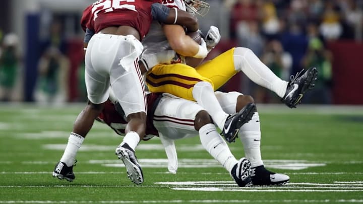 Sep 3, 2016; Arlington, TX, USA; Alabama Crimson Tide defensive back Marlon Humphrey (26) tackles USC Trojans tight end Taylor McNamara (48) during the first quarter at AT&T Stadium. Mandatory Credit: Tim Heitman-USA TODAY Sports