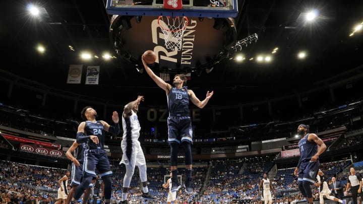 ORLANDO, FL – OCTOBER 10: Omri Casspi #18 of the Memphis Grizzlies rebounds the ball against the Orlando Magic during a pre-season game on October 10, 2018 at Amway Center in Orlando, Florida. NOTE TO USER: User expressly acknowledges and agrees that, by downloading and or using this photograph, User is consenting to the terms and conditions of the Getty Images License Agreement. Mandatory Copyright Notice: Copyright 2018 NBAE (Photo by Fernando Medina/NBAE via Getty Images)