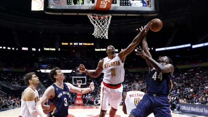 Oct 18, 2016; Atlanta, GA, USA; Atlanta Hawks center Dwight Howard (8) blocks a shot attempt by New Orleans Pelicans forward Solomon Hill (44) in the third quarter of their game at Philips Arena. The Hawks won 96-89. Mandatory Credit: Jason Getz-USA TODAY Sports